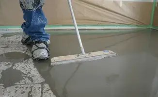 Uneven floor being professionally repaired in Rochester, NY